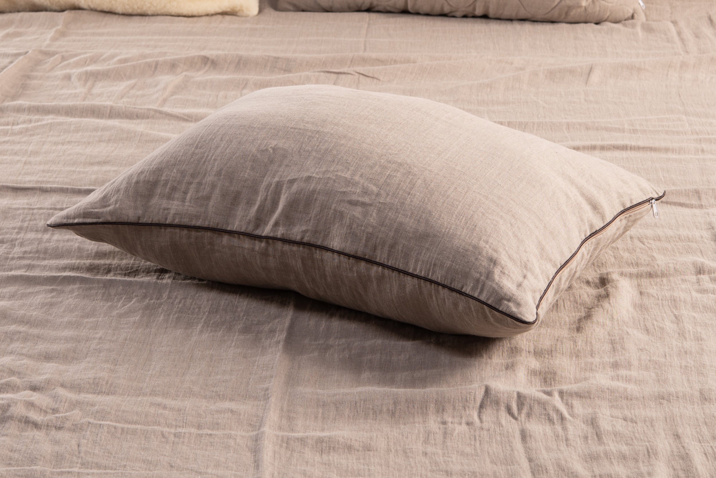 Classic Linen White Pillowcase with Oxford Style Decorative Stitching on Bed